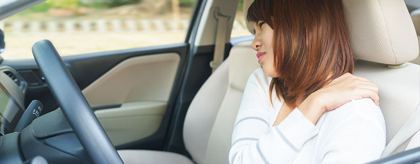 patient with shoulder pain in need of auto accident injury care in Lexington